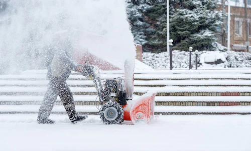 Snow removal on a sidewalk